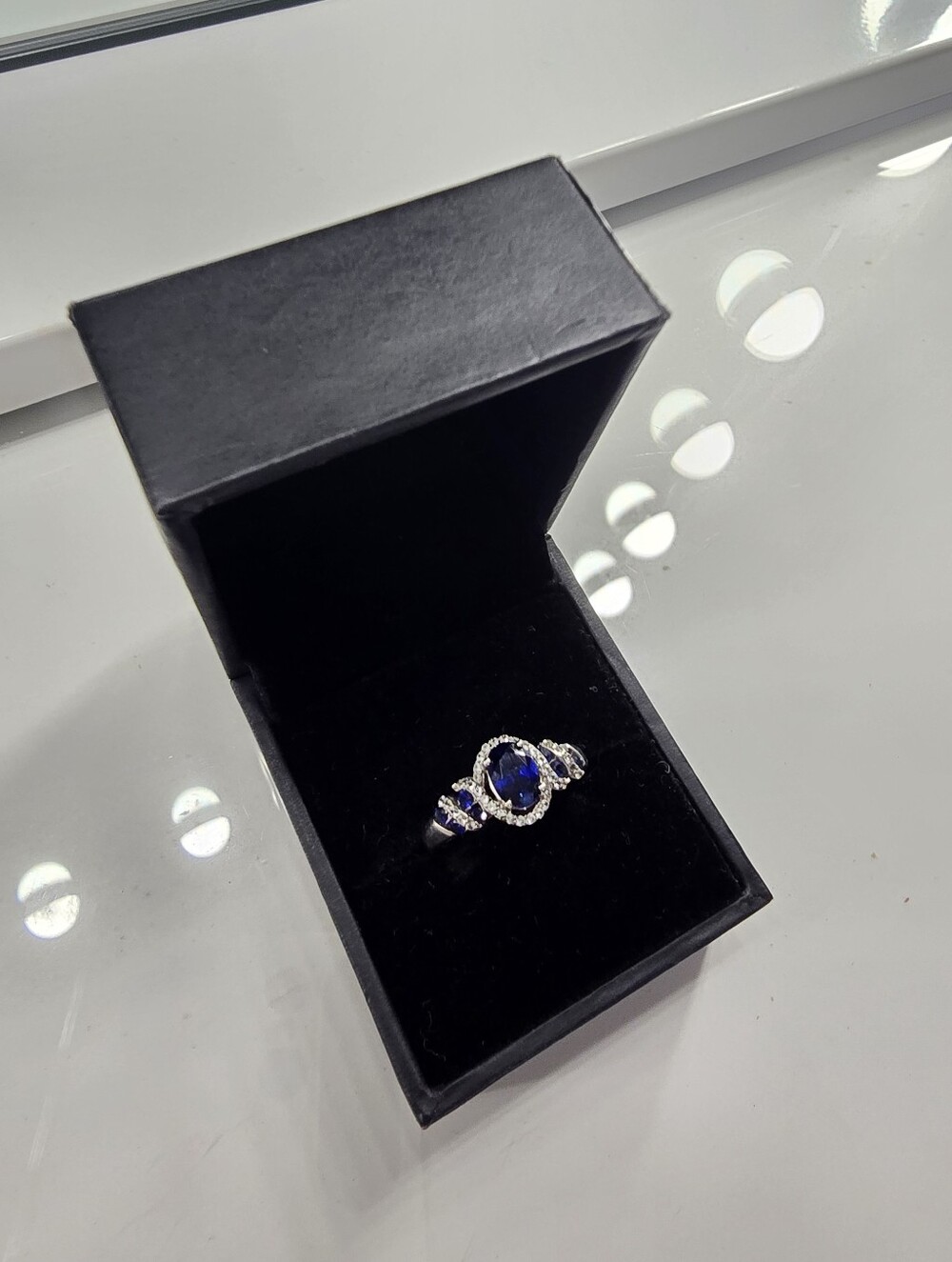 Elegant Blue Sapphire Halo Ring in Silver Tone